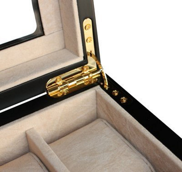 a close up of a clock on a table 