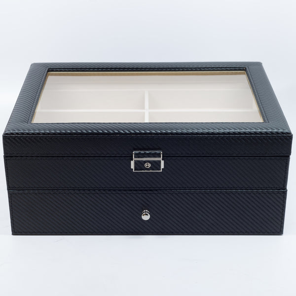 a piece of luggage sitting on top of a suitcase 