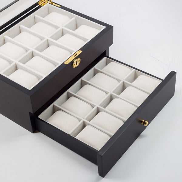 an open laptop computer sitting on top of a box 