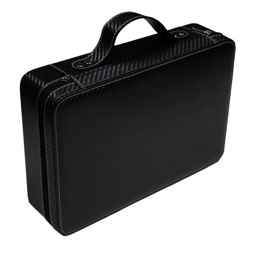 a black suitcase sitting on a white surface 