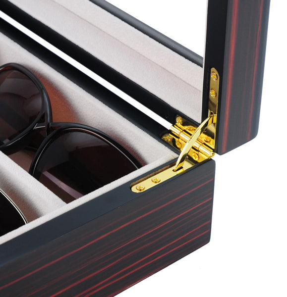 a close up of a bench with a yellow flower 